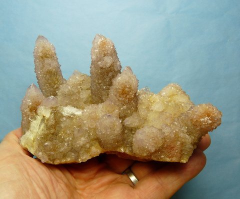 Pale amethyst coloured cactus quartz crystals on quartz matrix