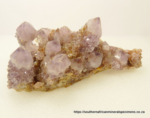 Light amethyst cactus quartz crystals on quartz matrix