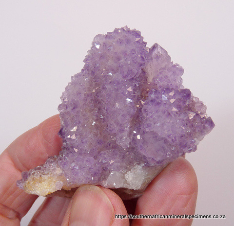 Small, drusy amethyst quartz crystals on matrix