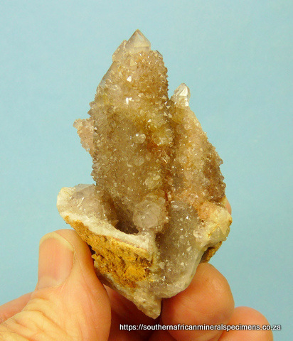 Cactus quartz crystals with greyish colour, on matrix
