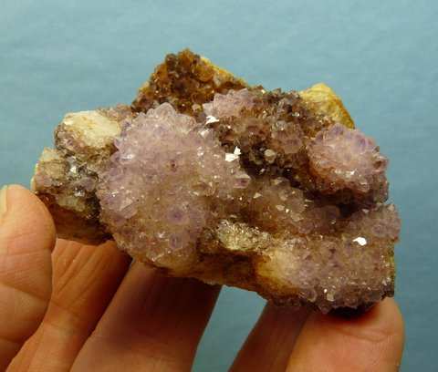 Drusy, light amethyst quartz crystals on matrix