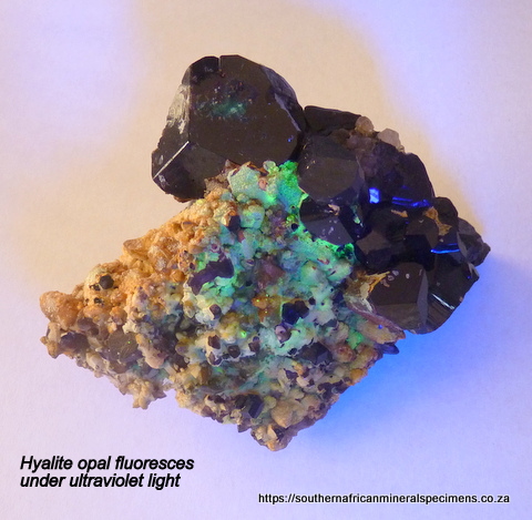 Hyalite opal on schorl and quartz