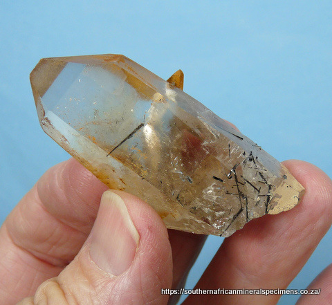 Quartz crystal with schorl inclusions