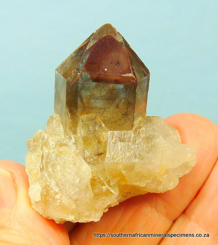 Phantom quartz crystal on quartz matrix