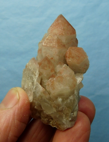 Light smoky quartz crystal with dark smoky inclusions