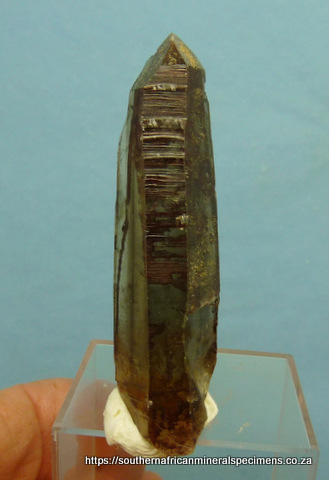 Smoky quartz crystal with interesting inclusion patterns of hematite