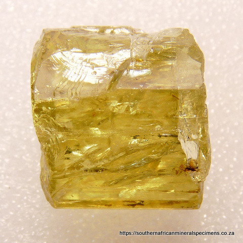 Piece of gemmy, golden-green fluorapatite
