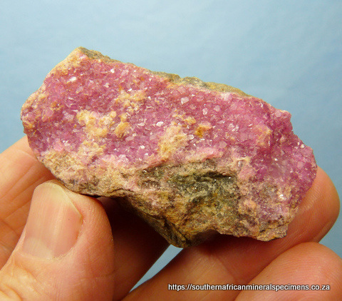Cobaltoan dolomite crystals on rock matrix