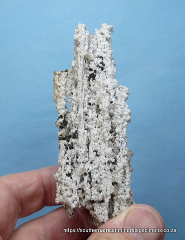 Dolomite stalactite with calcite and mottramite