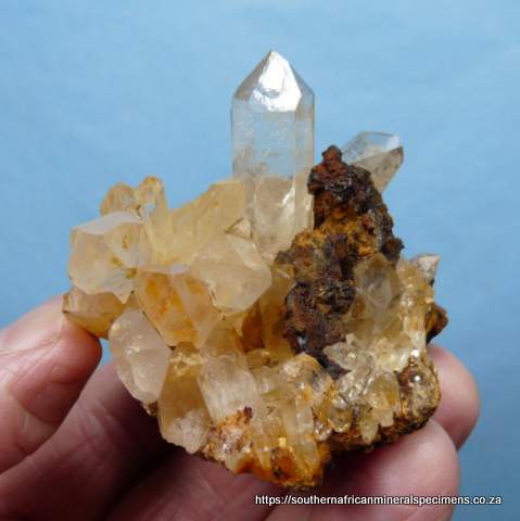 Quartz crystal with goethite, on quartz matrix