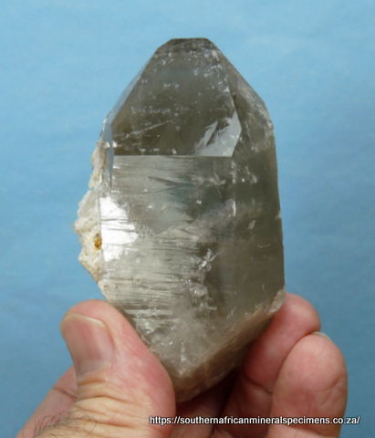 Smoky quartz crystal with light phantom