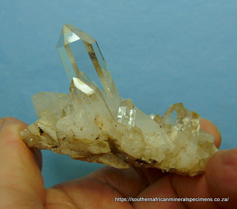 Quartz crystal group with very gemmy main crystal