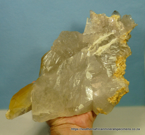 Unique piece of quartz with feldspar, dolomite and rutile needles