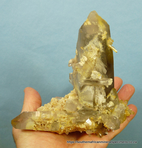 Smoky quartz crystals with dolomite and feldspar crystals