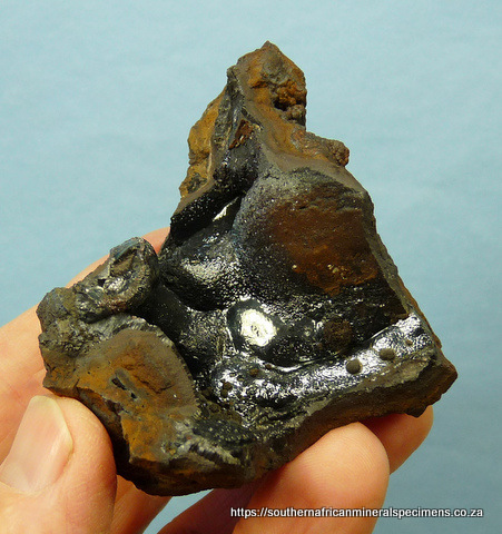 Layer of shiny hematite on iron ore